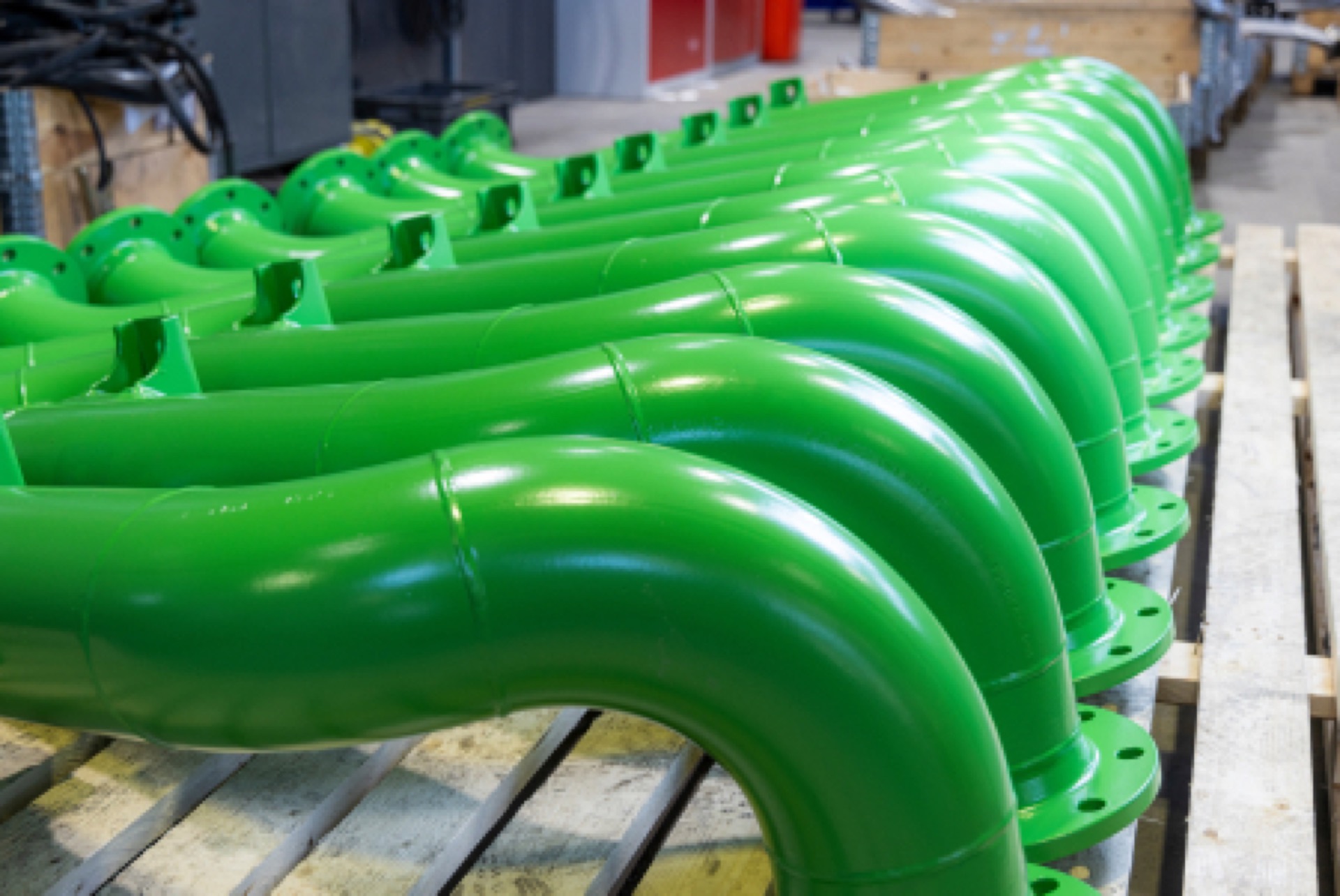 Green coated pipe modules on the shop floor